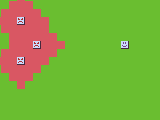 An image of a grid of green squares with the "dangerous" range of three enemy units highlighted.